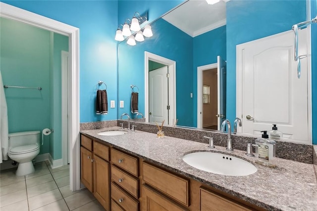 full bath featuring toilet, tile patterned flooring, ornamental molding, and a sink