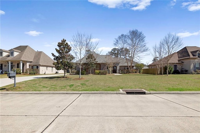 view of front of house with a front lawn