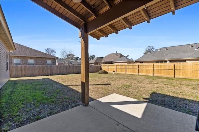 view of yard with a fenced backyard and a patio