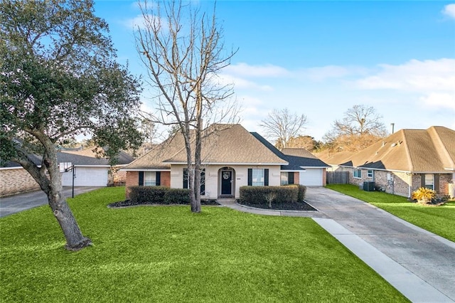 single story home with a garage, a front lawn, and a shingled roof