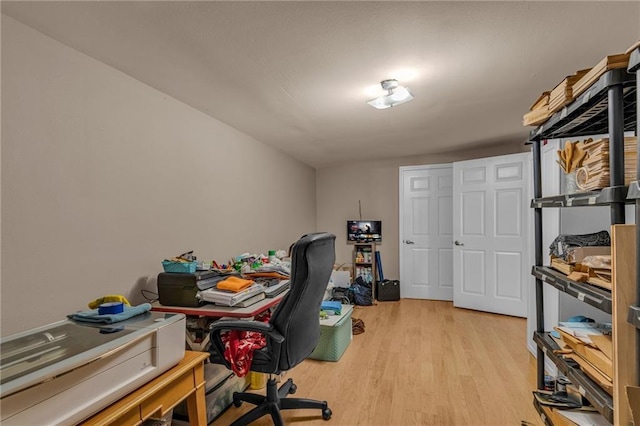 office area with light wood finished floors