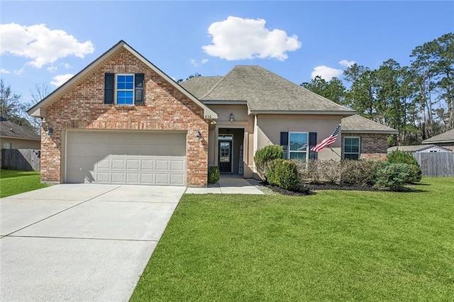 view of front facade with a garage, brick siding, fence, driveway, and a front lawn