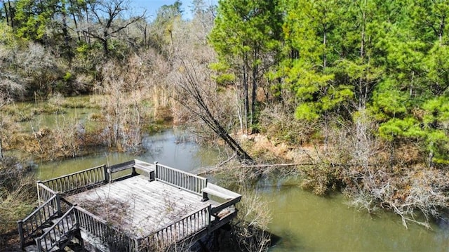 view of dock with a water view and stairs