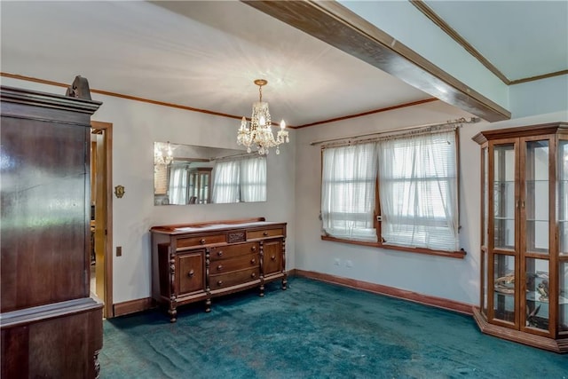 dining space with ornamental molding, an inviting chandelier, baseboards, and carpet floors