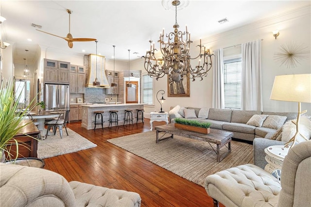 1244 Annunciation St, New Orleans, LA 70130 - living room featuring ornamental molding, dark wood-style flooring, and visible vents