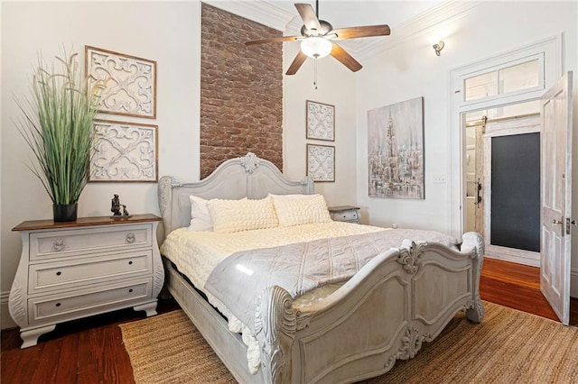 1244 Annunciation St, New Orleans, LA 70130 - bedroom featuring ceiling fan and wood finished floors