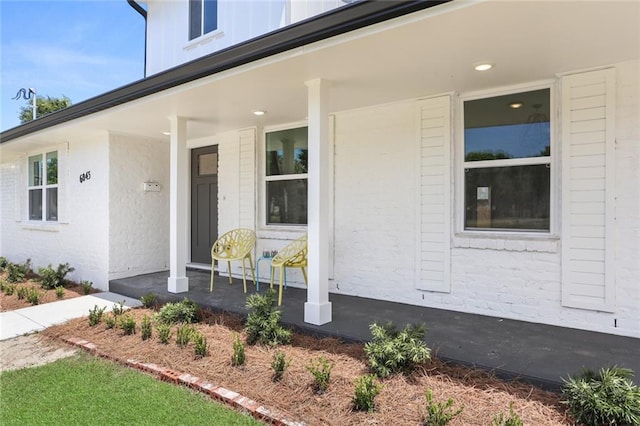 6043 Paris Ave, New Orleans, LA 70122 - property entrance with a porch