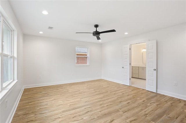 6043 Paris Ave, New Orleans, LA 70122 - unfurnished bedroom featuring light wood-style flooring, recessed lighting, connected bathroom, baseboards, and a ceiling fan