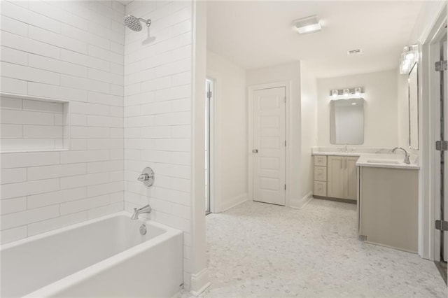 6043 Paris Ave, New Orleans, LA 70122 - bathroom featuring vanity, baseboards, and  shower combination