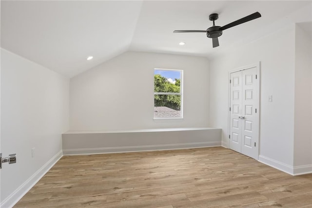 6043 Paris Ave, New Orleans, LA 70122 - additional living space featuring light wood-type flooring, vaulted ceiling, baseboards, ceiling fan, and recessed lighting