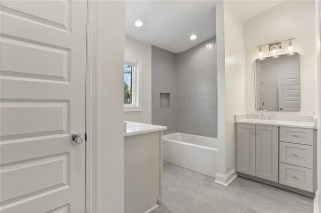 6043 Paris Ave, New Orleans, LA 70122 - full bath featuring vanity, baseboards, shower / tub combination, and recessed lighting