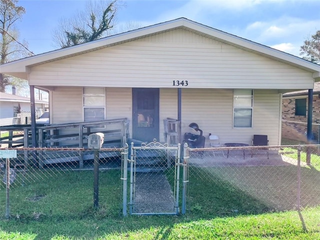 view of front of property with a gate, fence, and a porch