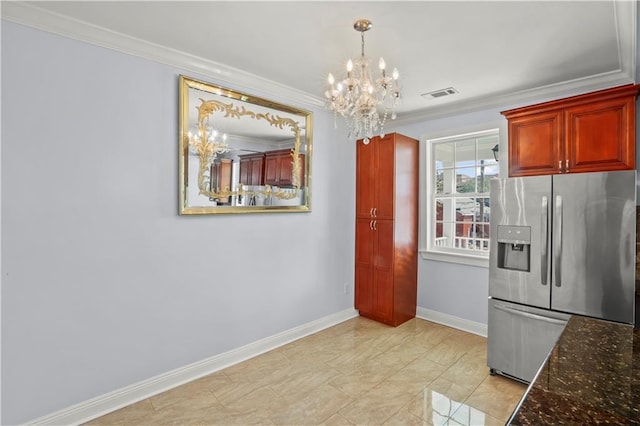 kitchen featuring a chandelier, visible vents, baseboards, ornamental molding, and stainless steel refrigerator with ice dispenser