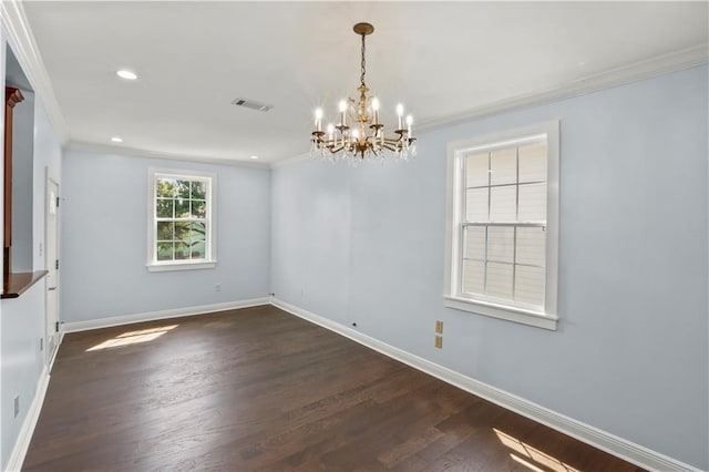 unfurnished room featuring baseboards, visible vents, dark wood finished floors, and crown molding