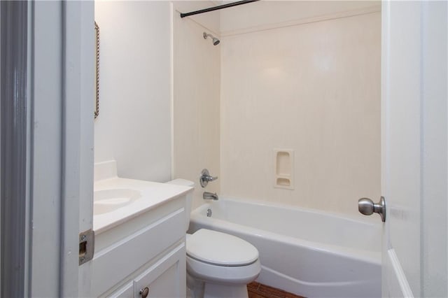 full bath with toilet,  shower combination, and vanity