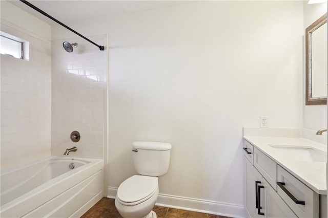 38 Moss Dr, La Place, LA 70068 - full bath featuring shower / bathtub combination, toilet, vanity, baseboards, and tile patterned floors