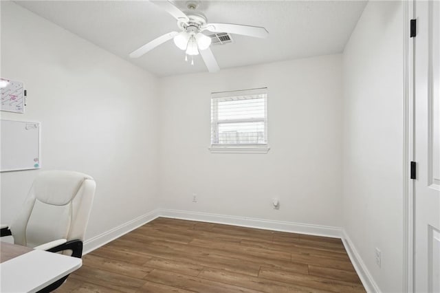38 Moss Dr, La Place, LA 70068 - unfurnished office with ceiling fan, baseboards, and wood finished floors