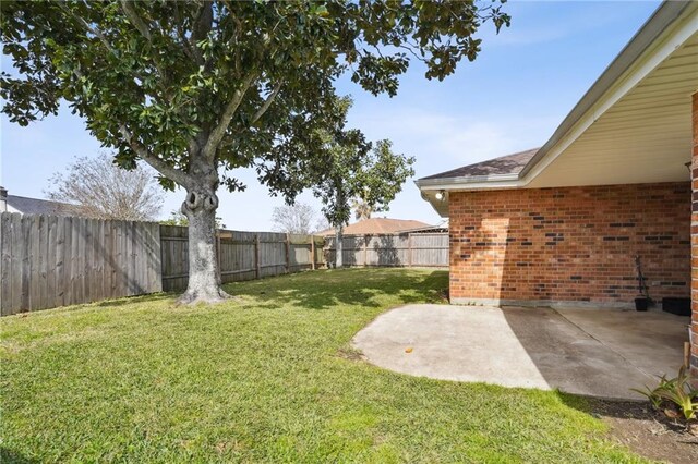 38 Moss Dr, La Place, LA 70068 - view of yard with a patio area and a fenced backyard