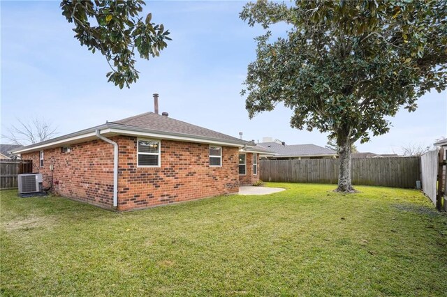 38 Moss Dr, La Place, LA 70068 - view of yard featuring a patio, a fenced backyard, and cooling unit