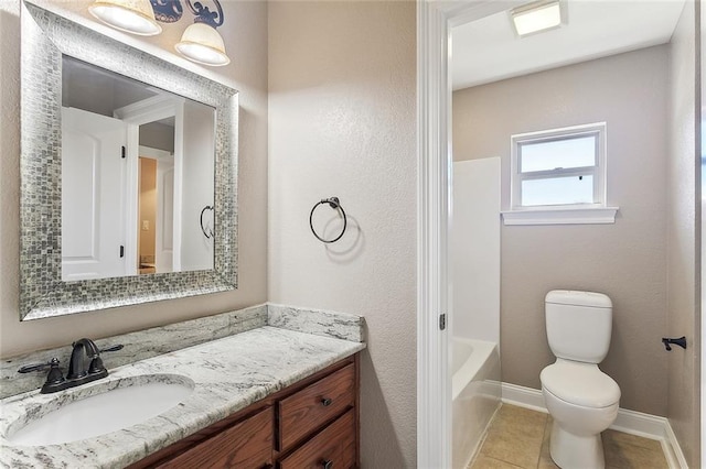 full bath with tile patterned flooring, toilet, vanity, and baseboards