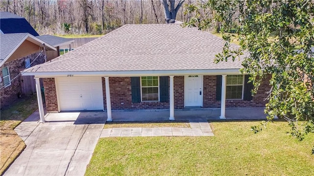 ranch-style home with concrete driveway, brick siding, a front lawn, and an attached garage