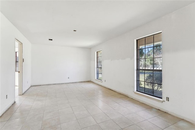 empty room featuring light tile patterned flooring