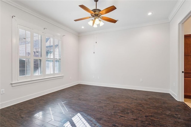 empty room with dark wood-style floors, crown molding, baseboards, and ceiling fan