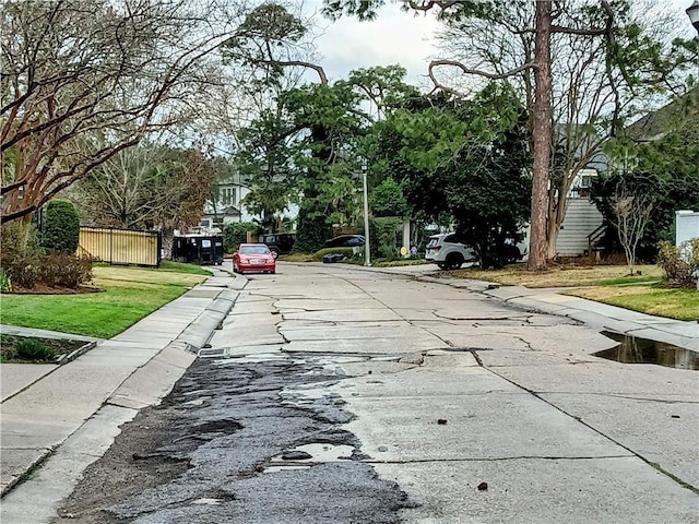 view of road featuring curbs