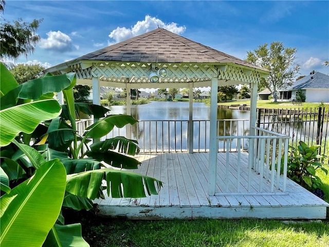 dock area with a water view and a gazebo