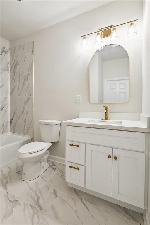 bathroom with baseboards, toilet,  shower combination, marble finish floor, and vanity