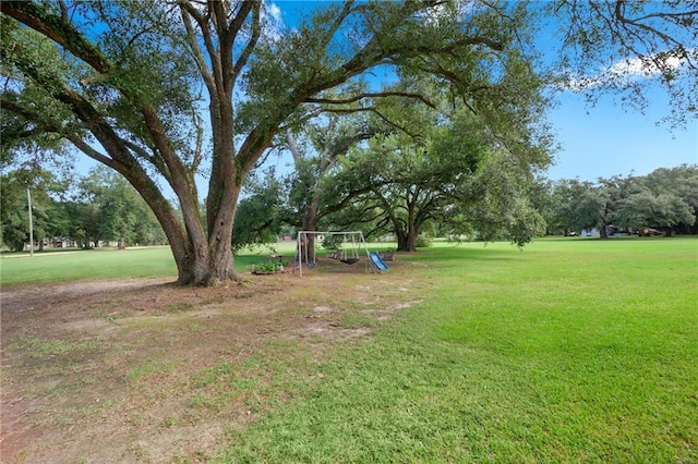 view of yard featuring playground community