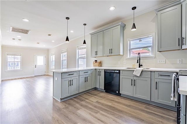 kitchen featuring dishwasher, a peninsula, crown molding, gray cabinetry, and a sink