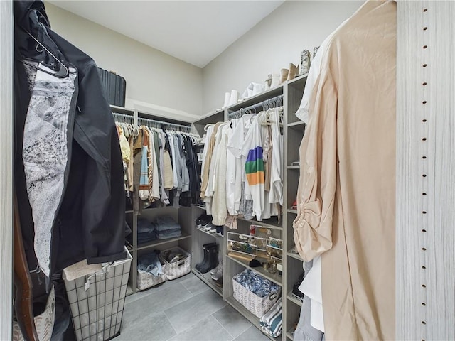 spacious closet with tile patterned flooring