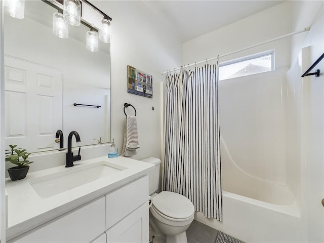 bathroom with toilet, shower / bath combo, and vanity