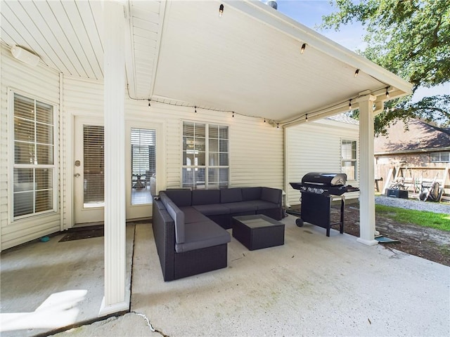 view of patio with an outdoor hangout area and grilling area