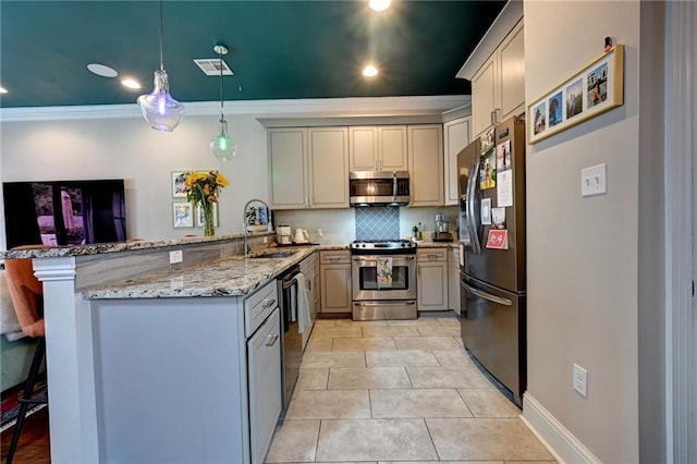 kitchen featuring light tile patterned floors, visible vents, a peninsula, stainless steel appliances, and a sink