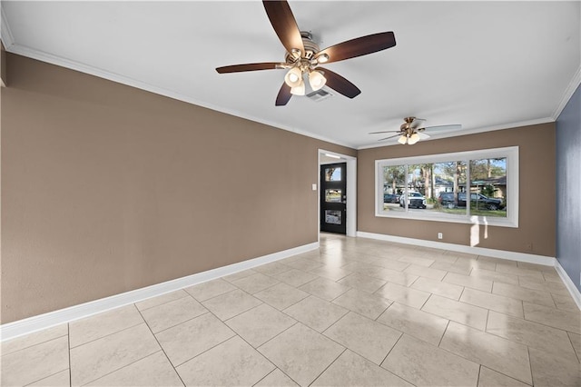 spare room featuring light tile patterned floors, ornamental molding, visible vents, and baseboards