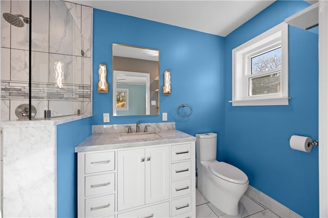 9420 Gerald St, River Ridge, LA 70123 - full bath with toilet, vanity, a shower, and baseboards