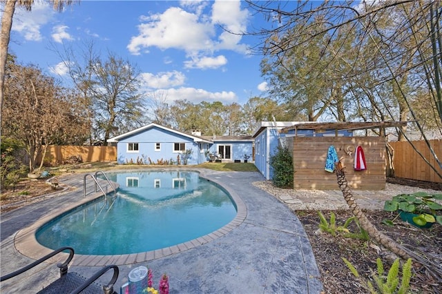 view of pool featuring a fenced backyard and a fenced in pool