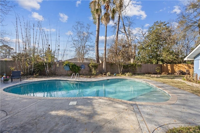 view of pool with a fenced backyard, a fenced in pool, and a patio