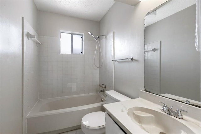 full bathroom featuring toilet,  shower combination, a textured ceiling, and vanity
