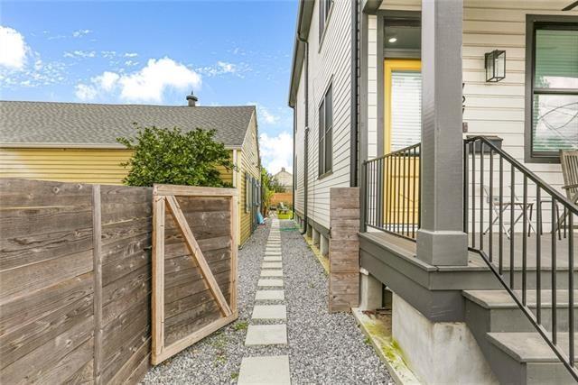 view of property exterior with fence