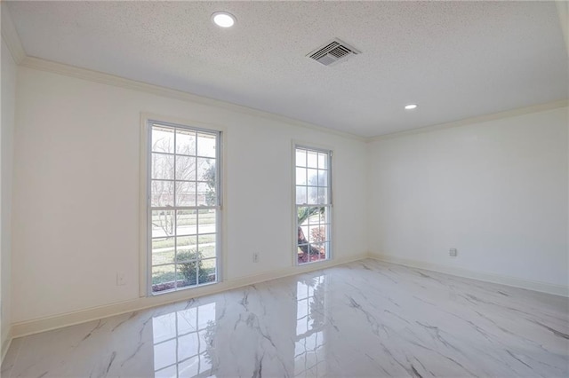 unfurnished room featuring a textured ceiling, marble finish floor, visible vents, and baseboards