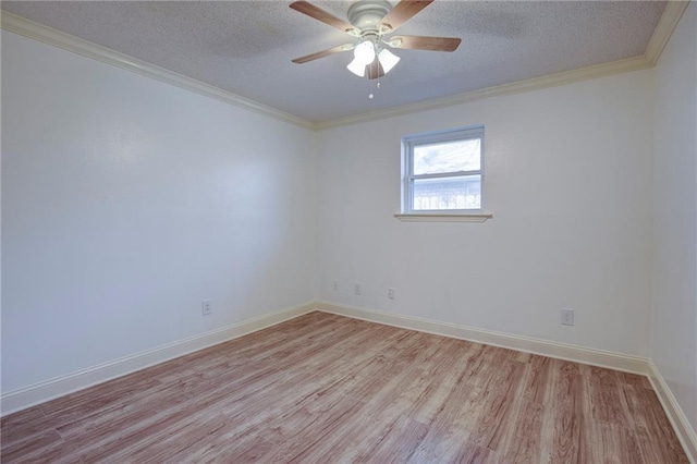 unfurnished room featuring a textured ceiling, ornamental molding, and light wood-style flooring