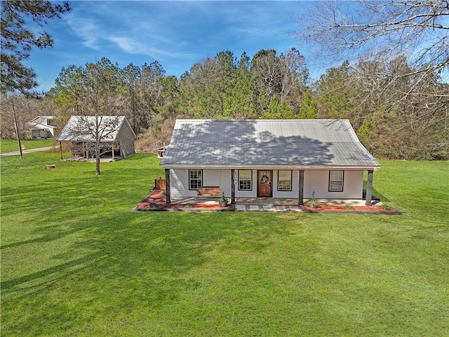 exterior space with covered porch and a front lawn