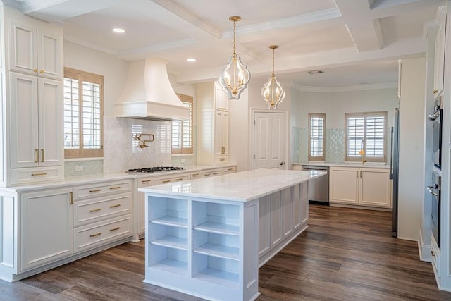 kitchen featuring custom range hood, a kitchen island, stainless steel appliances, white cabinetry, and open shelves