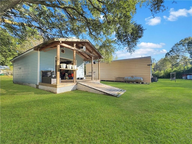back of house with a yard