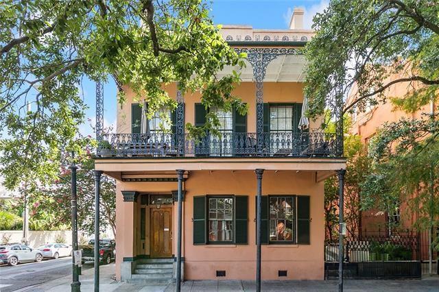 741 Esplanade Ave Unit 5, New Orleans, LA 70116 - back of house with crawl space, a balcony, fence, and stucco siding
