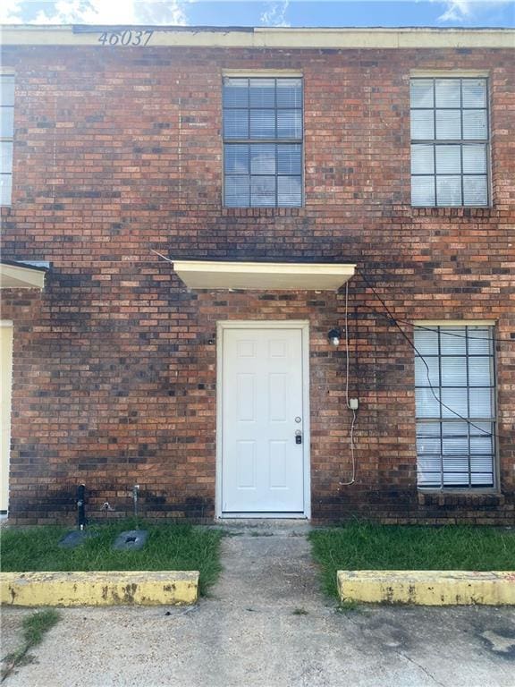 view of front of property with brick siding