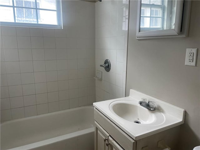 full bathroom with vanity and bathing tub / shower combination